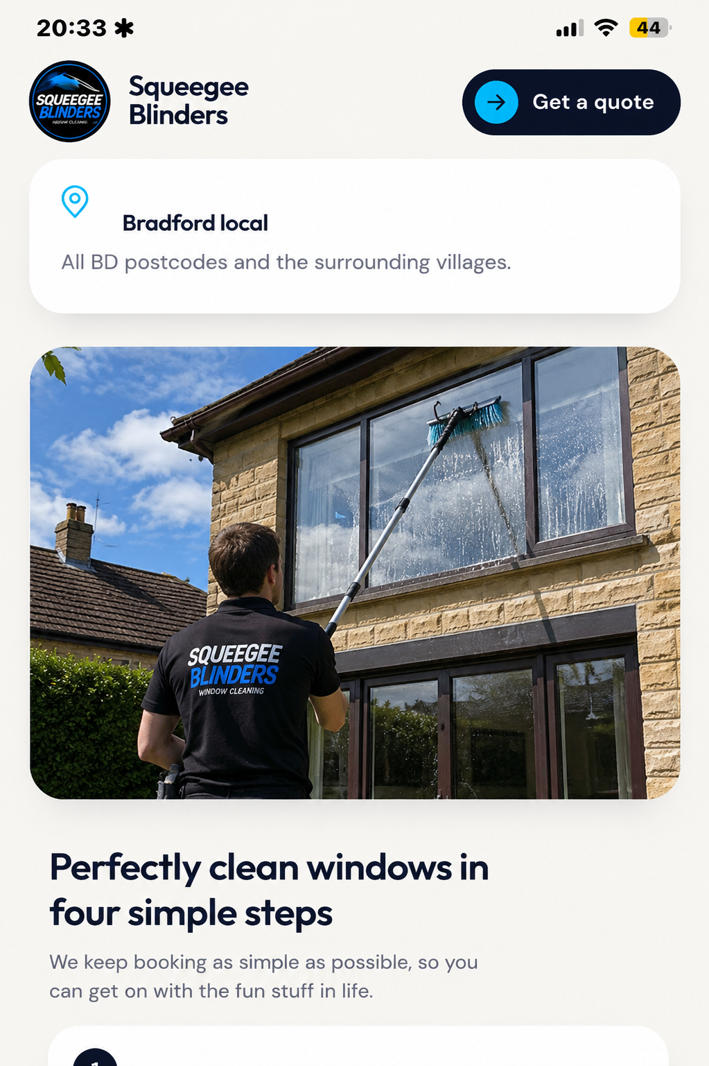 Squeegee Blinders cleaner using a water-fed pole on windows at a Bradford home