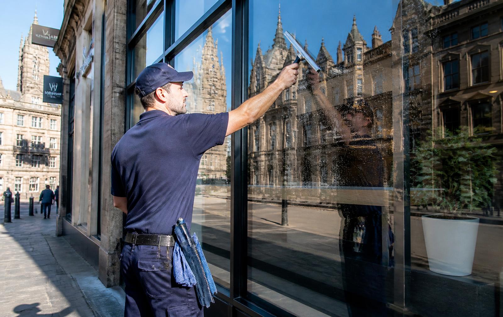Squeegee Blinders window cleaner cleaning windows in Bradford